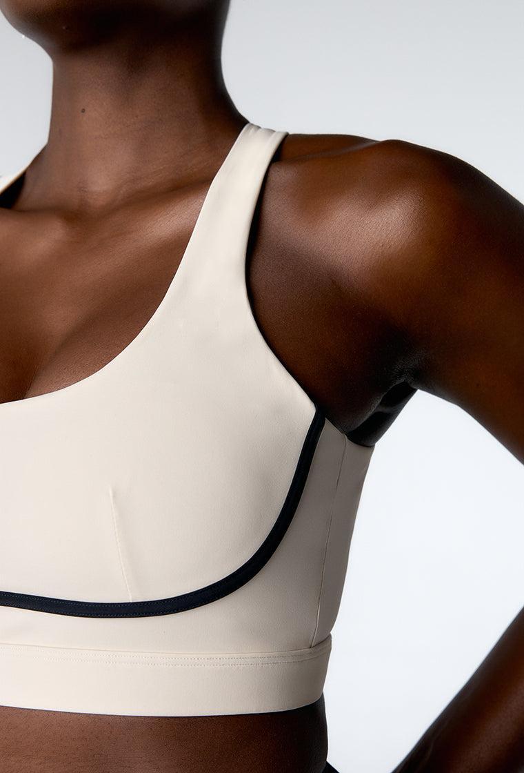 Top deportivo de sujeción alta Tao - Cream-Black Limba