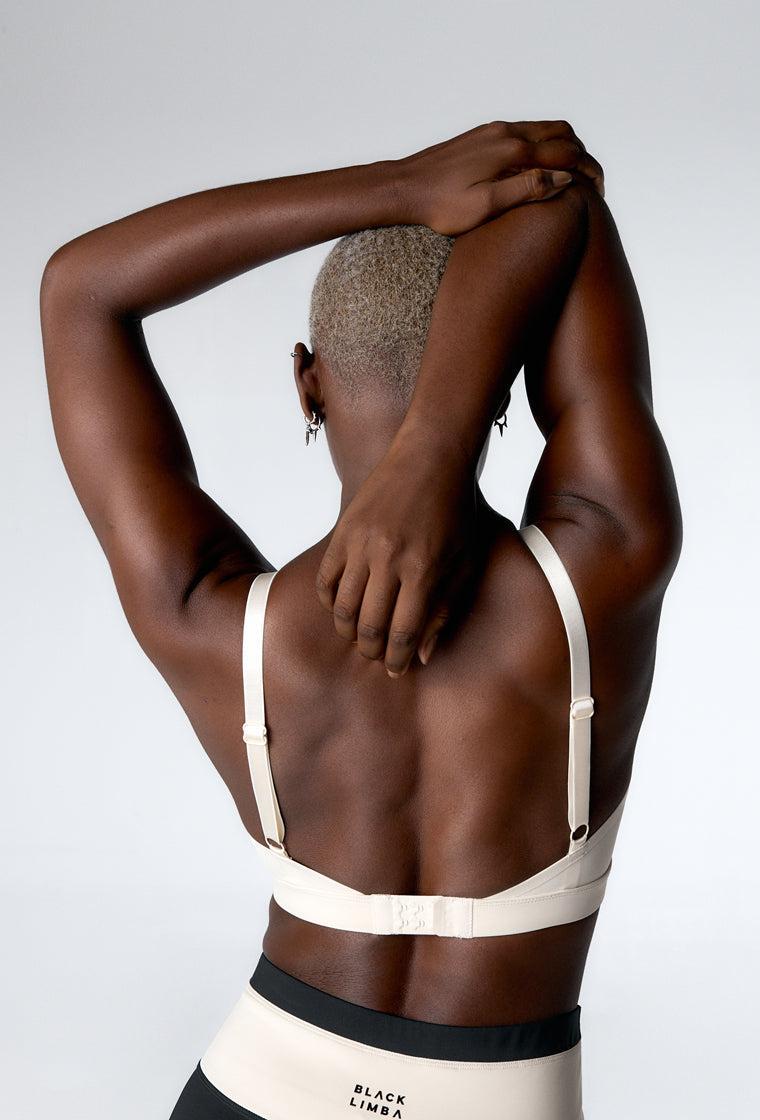Top deportivo de sujeción media Nadia - Cream-Black Limba