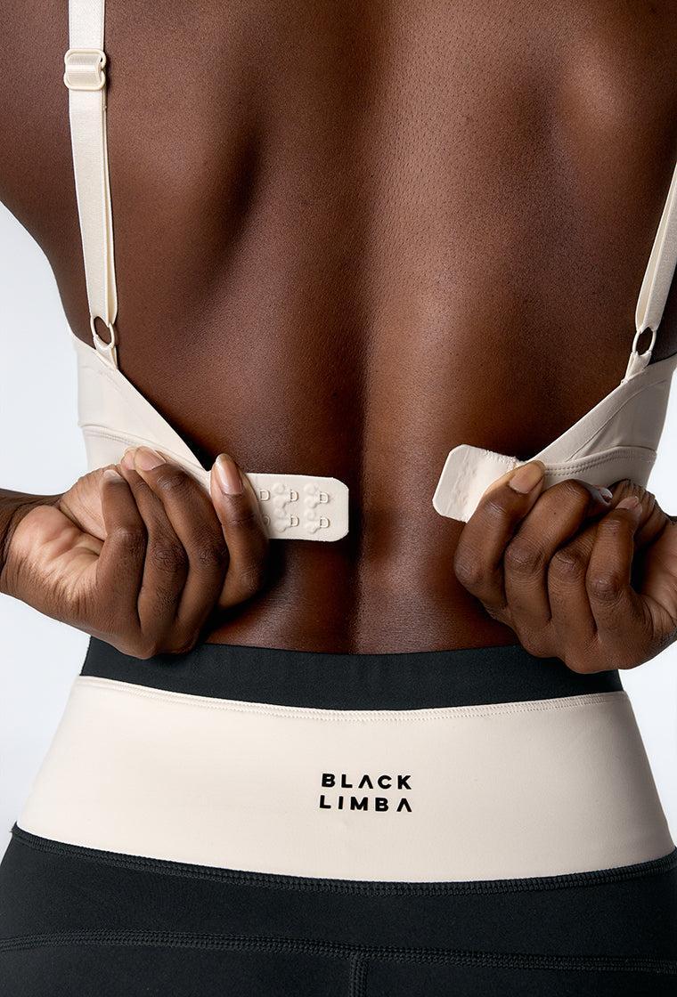 Top deportivo de sujeción media Nadia - Cream-Black Limba