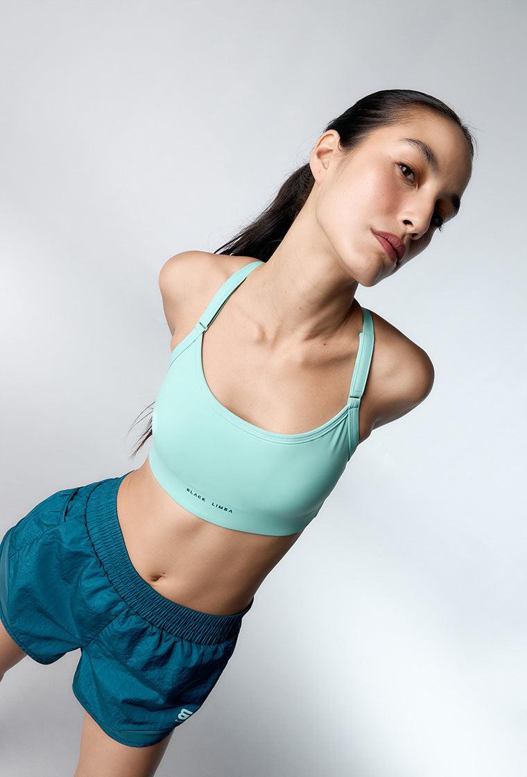 Top deportivo de sujeción media Speedy - Mint-Black Limba