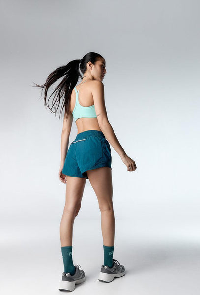 Top deportivo de sujeción media Speedy - Mint-Black Limba