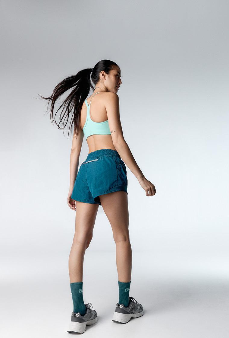 Top deportivo de sujeción media Speedy - Mint-Black Limba