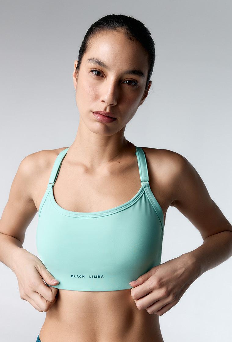 Top deportivo de sujeción media Speedy - Mint-Black Limba