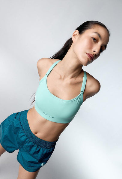 Top deportivo de sujeción media Speedy - Mint-Black Limba