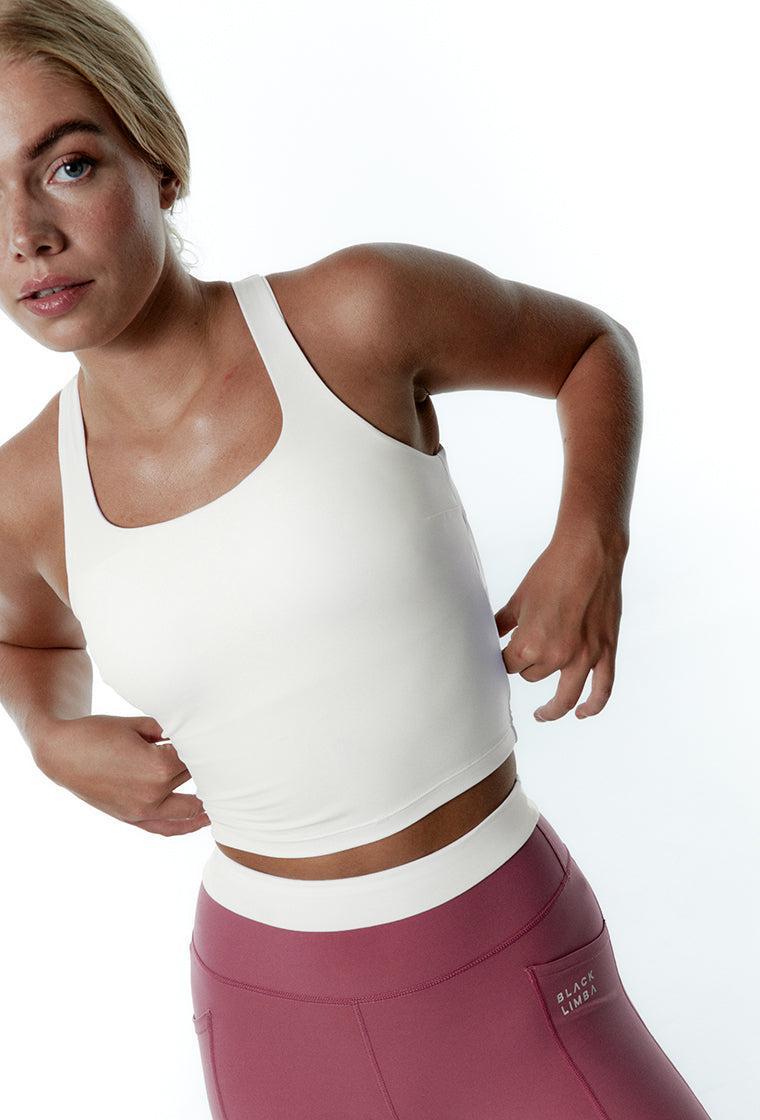 Top deportivo sujeción baja ApexFit - Cream-Black Limba