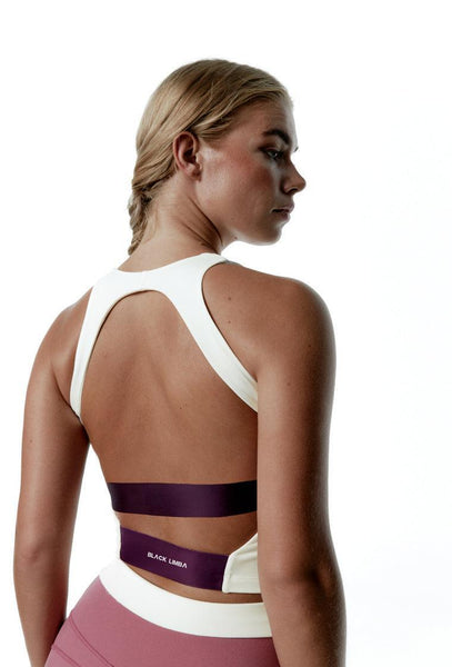 Top deportivo sujeción baja ApexFit - Cream-Black Limba