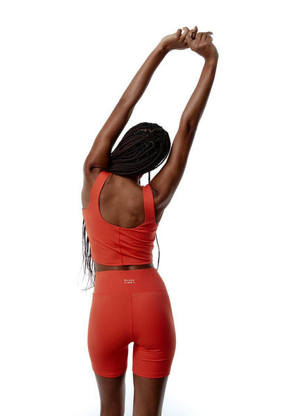 Top deportivo sujeción media Bhakti - Coral-Black Limba