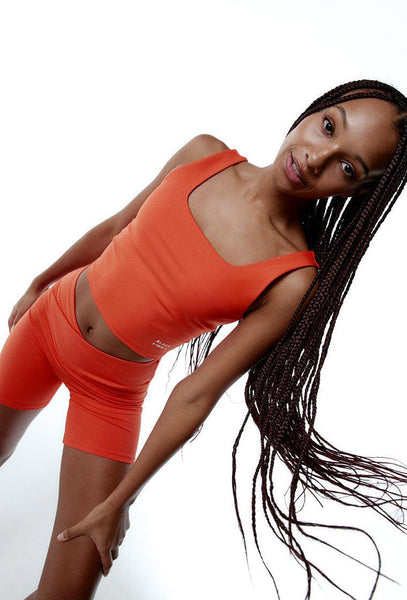 Top deportivo sujeción media Bhakti - Coral-Black Limba